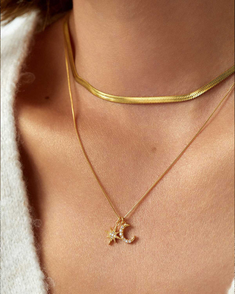 gold snake chain and dainty star and moon necklace 
