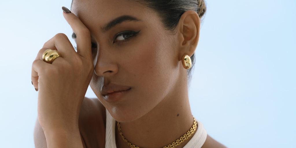gold earrings styles with bold gold rings