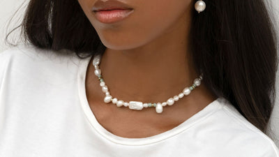 pearl choker and pearl earrings styled with white tee shirt