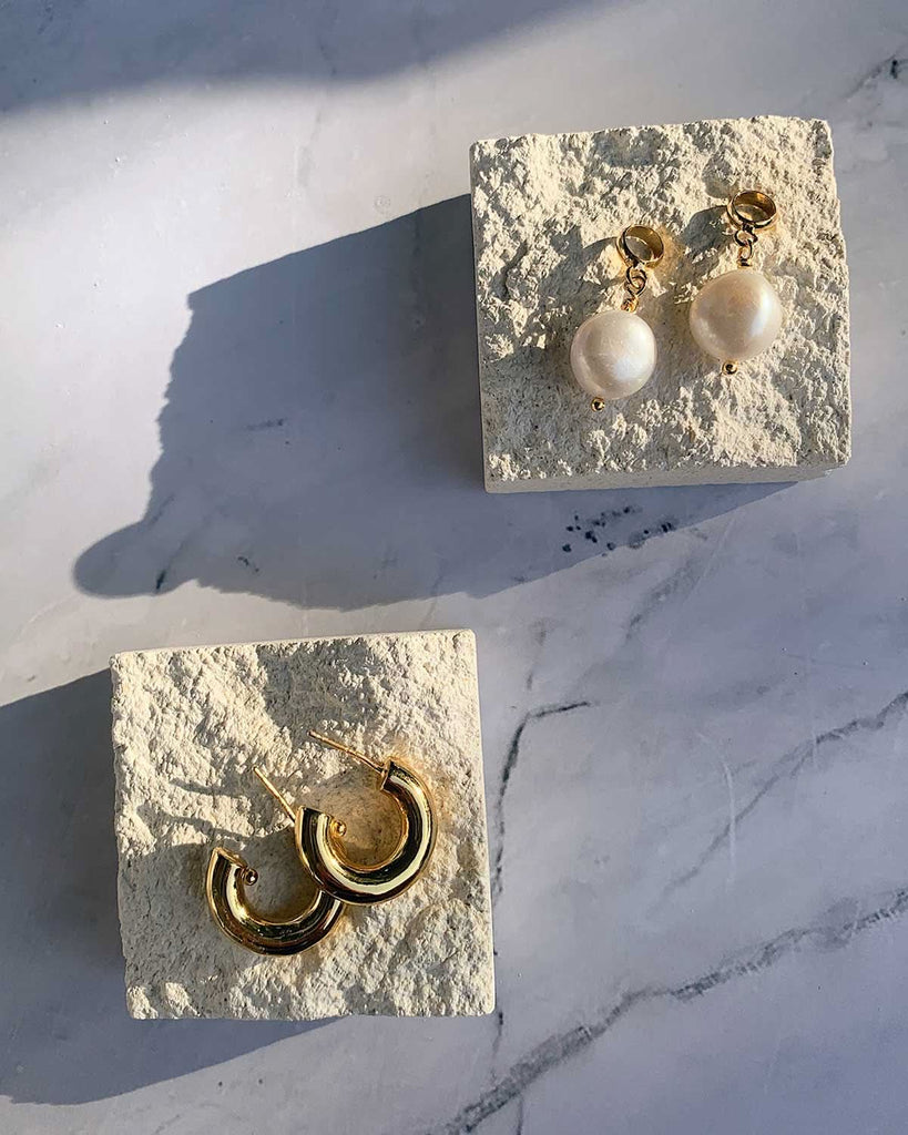 gold hoops and pearl charms