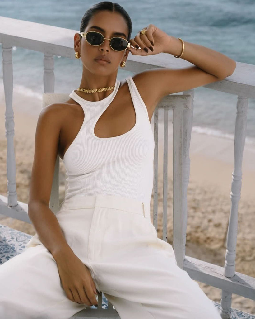 gold minimal jewelry with white outfit