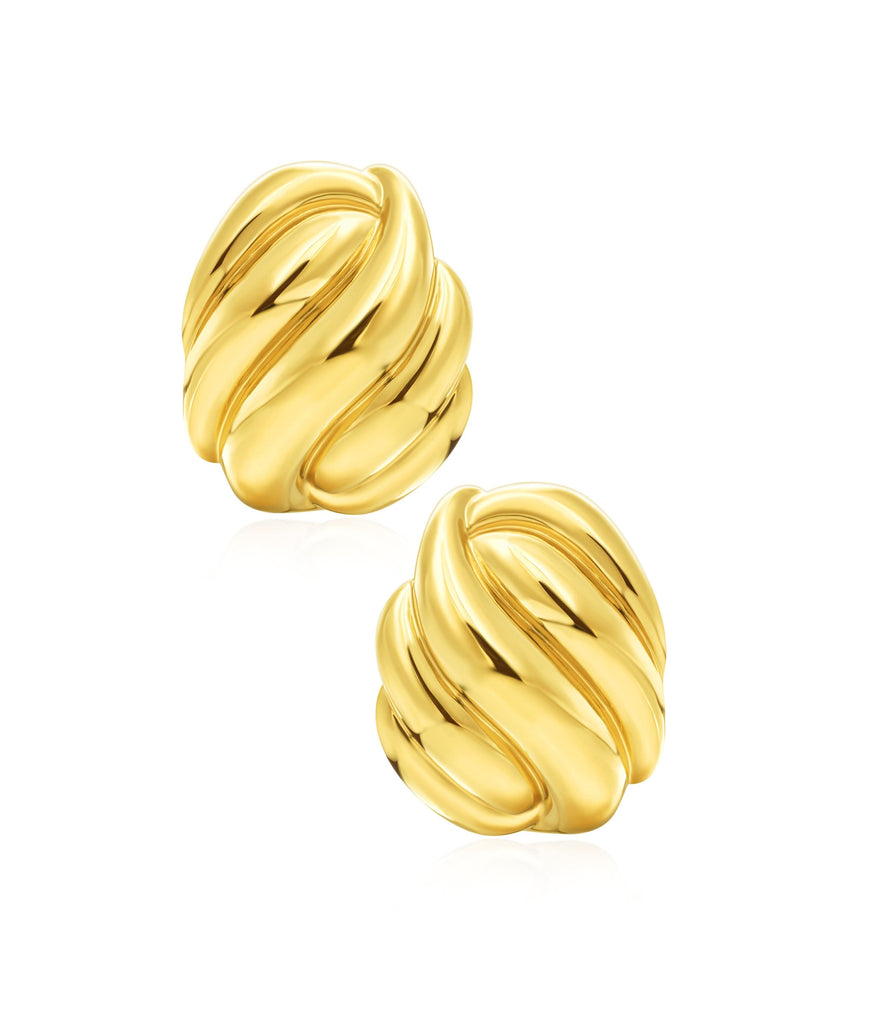chunky gold earrings in white background