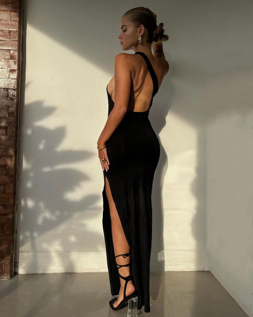 black open back dress and big gold earrings outfit