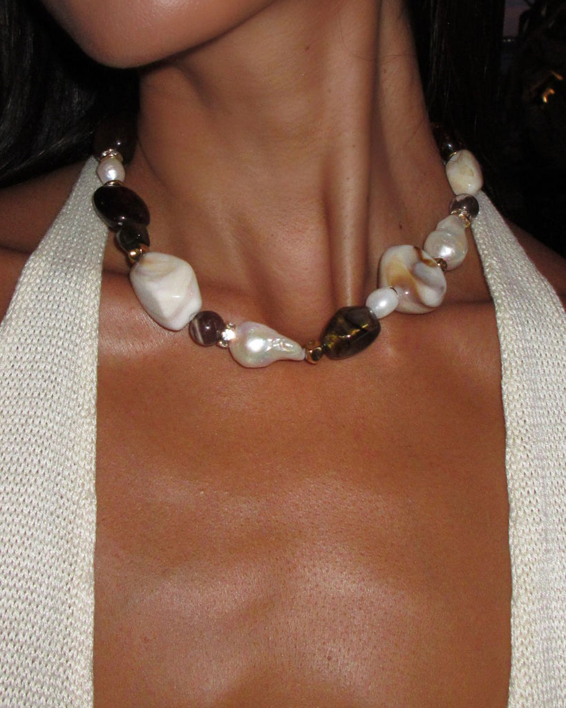 chunky beaded necklace close up on a model