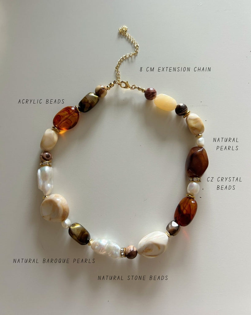 large bead necklace on a light background