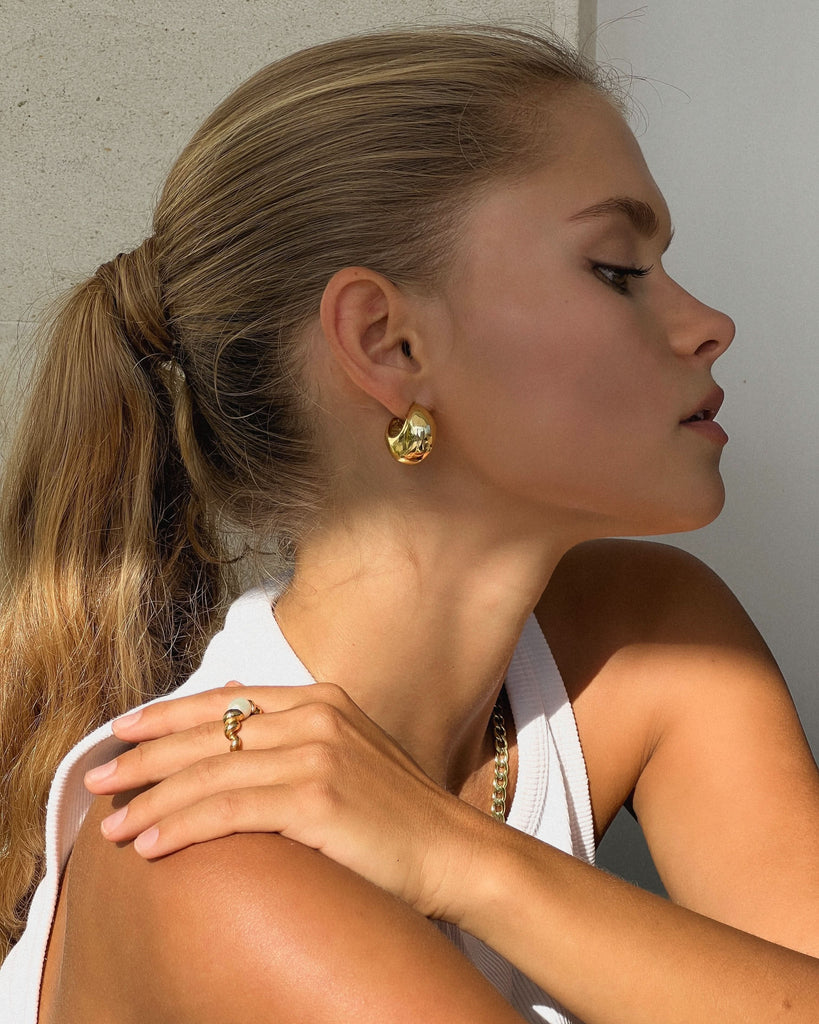 side view wide gold hoops