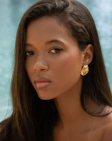 Woman wearing stud earrings