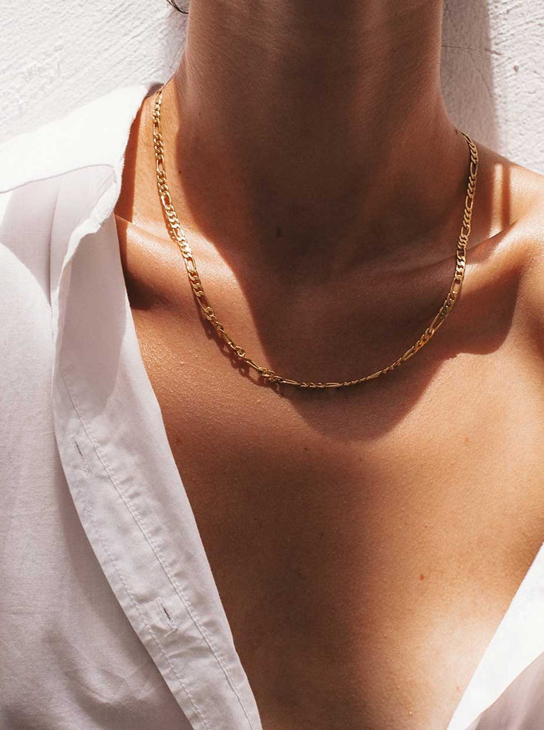 open white button up and gold necklace 