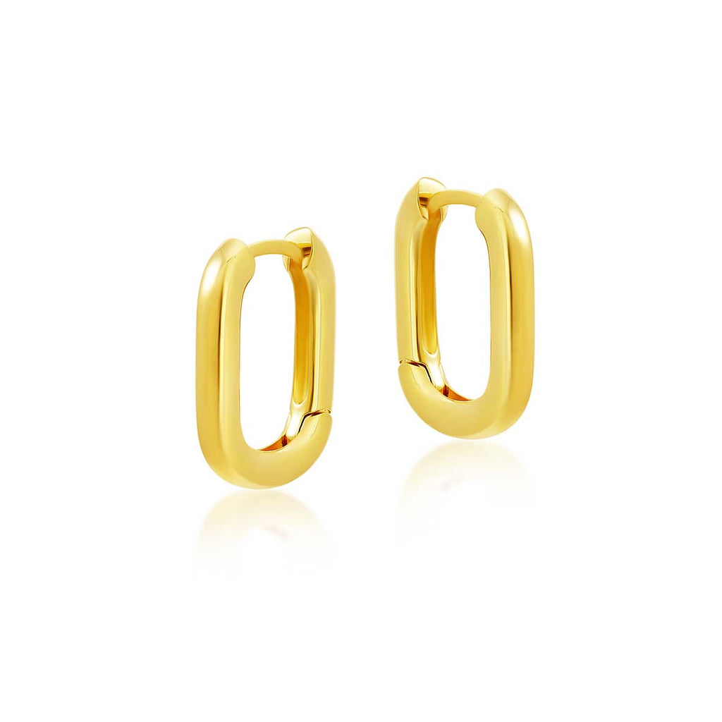gold paper clip earrings on white background 