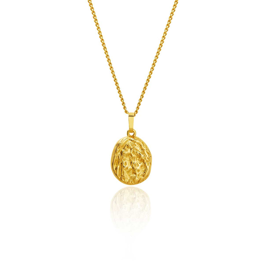 Gold oval pendant necklace on white background