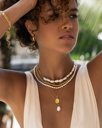 Model wearing Sansara Layered Pearl Necklace