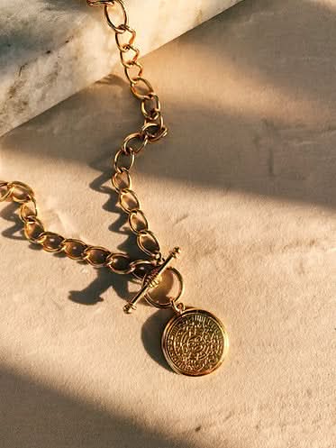 gold aztec pendant necklace 