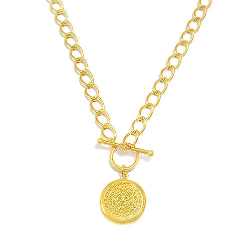 gold toggle necklace on white background 